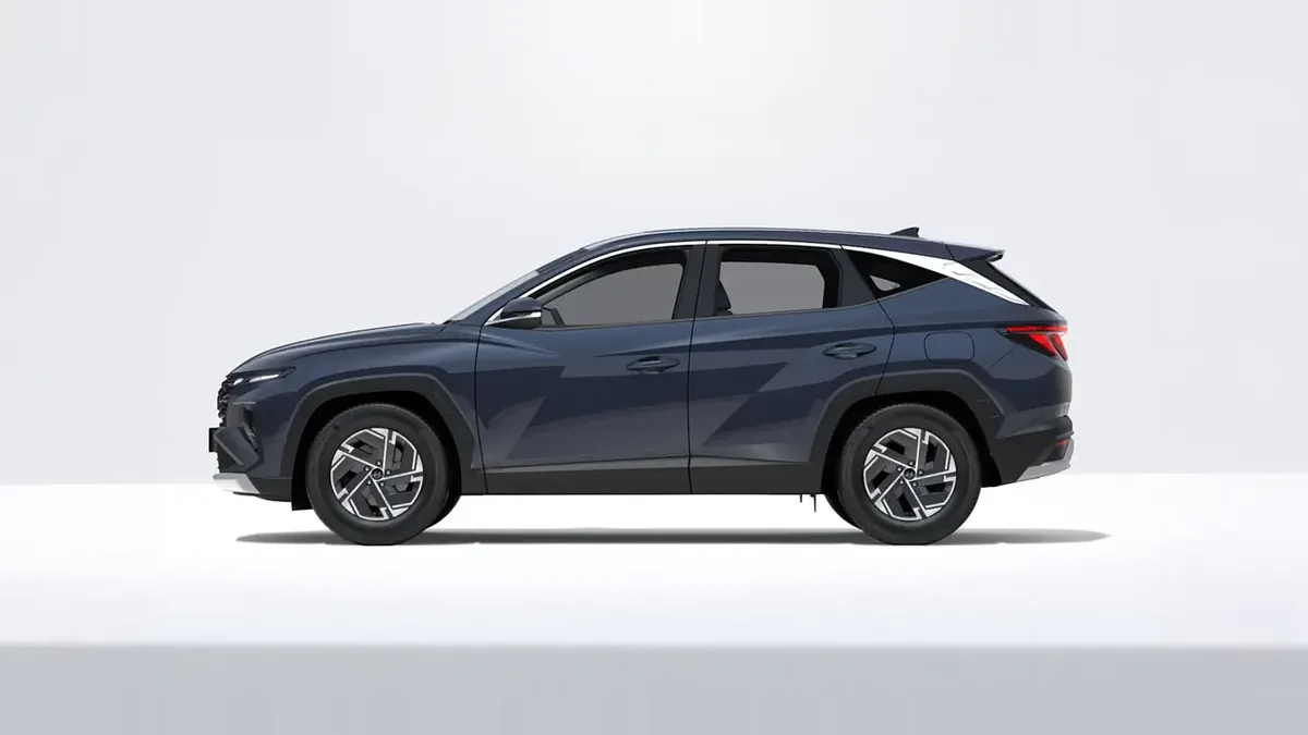 Hyundai Tucson FL 1.6T 239CV HEV AT Klass en renting en Zaragoza — Lateral